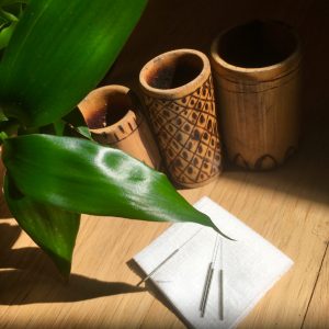 Table with bamboo leaves and moxa needles